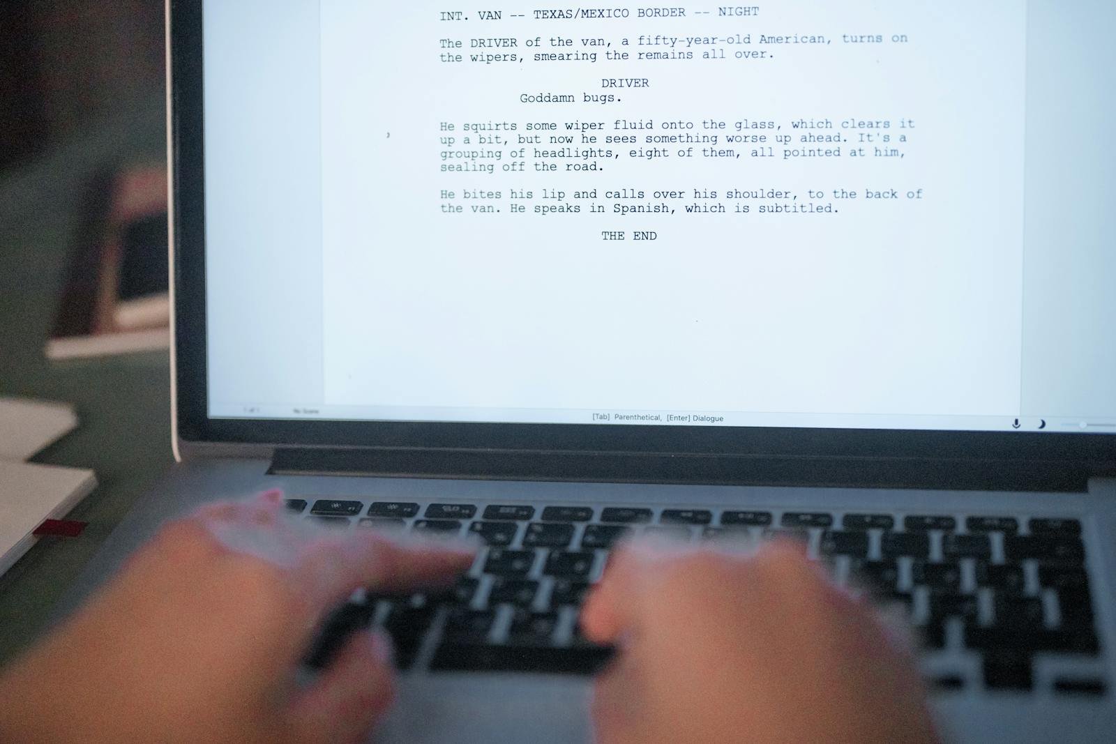 Hands typing a film script on a laptop illustrating Blog Post Structure: My Proven SEO Framework