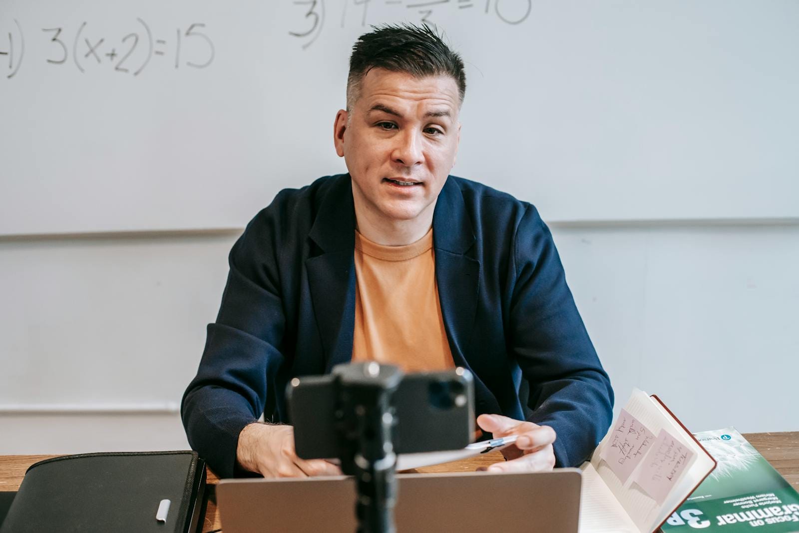 Educator conducting online class via video call, illustrating remote learning