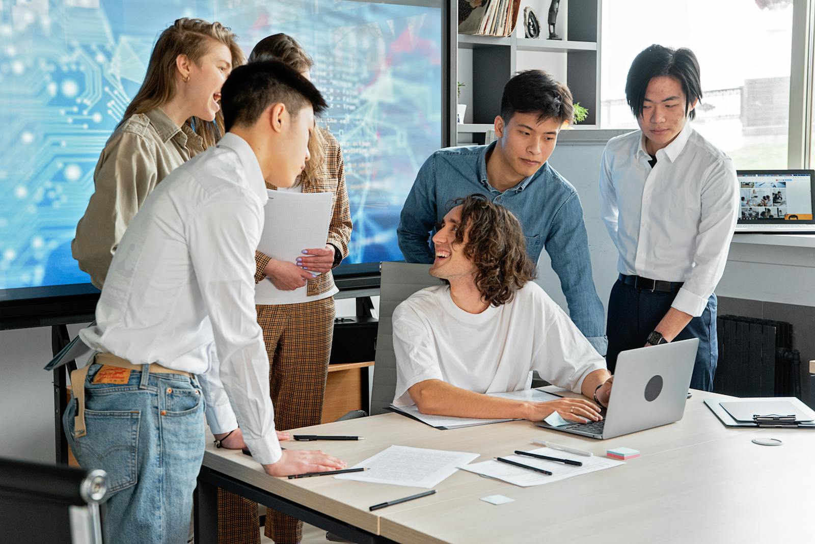 Diverse team of professionals engaged in collaborative meeting
