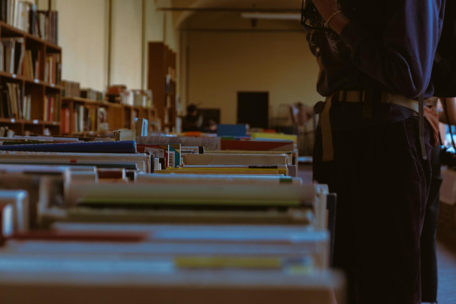 Peaceful library setting with rows of books offering knowledge