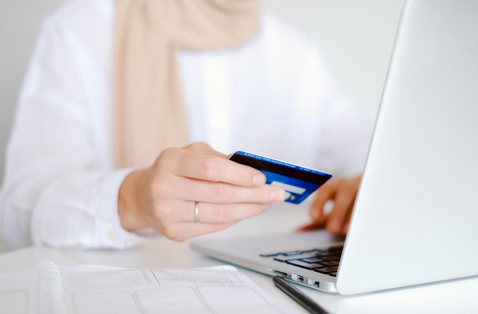 Close-up of credit card and laptop for online shopping